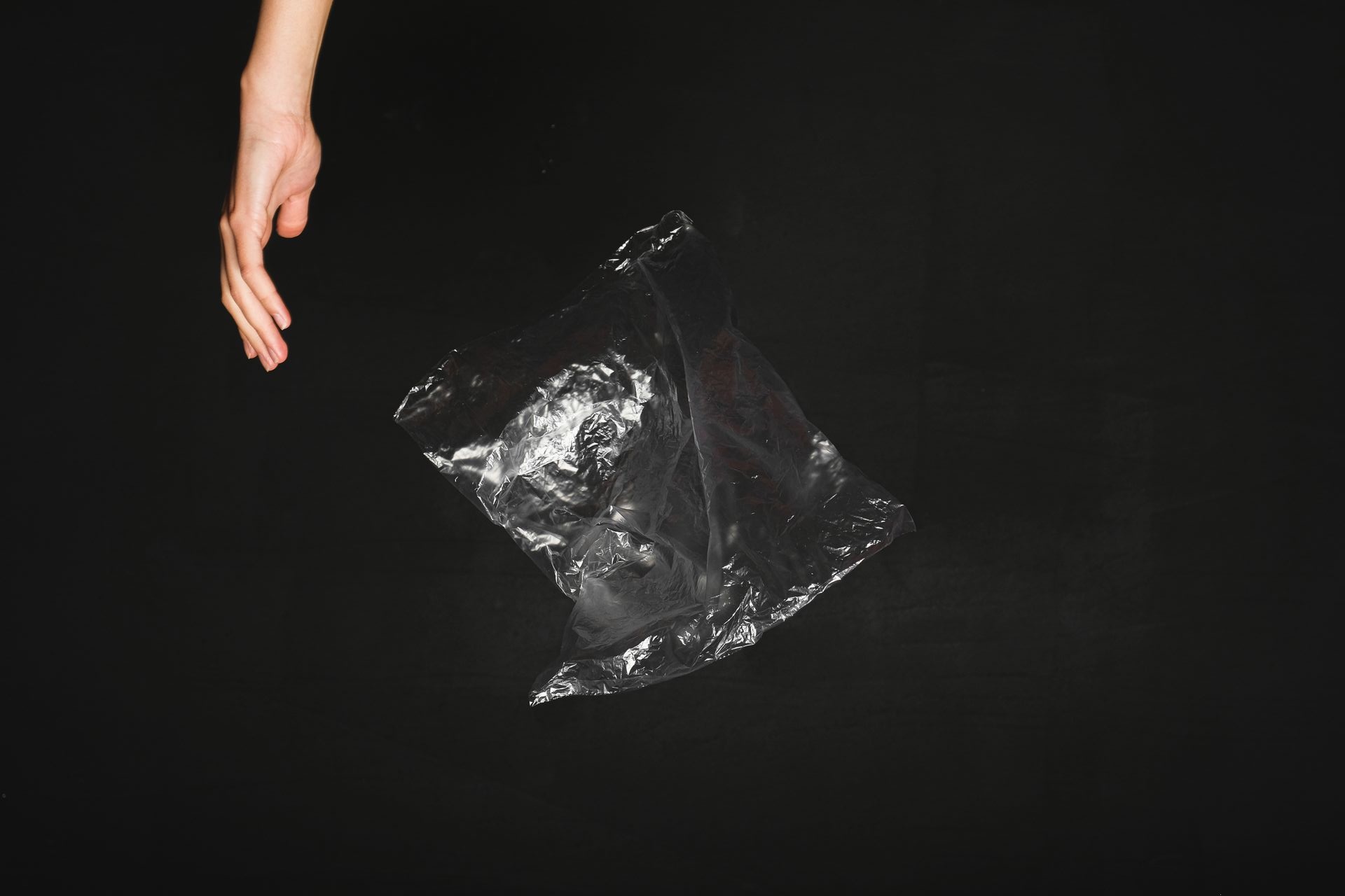 can art be about nothing, photography of hand and clear bag